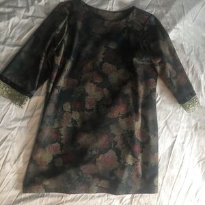 Boutique style dress with gold accent sleeves